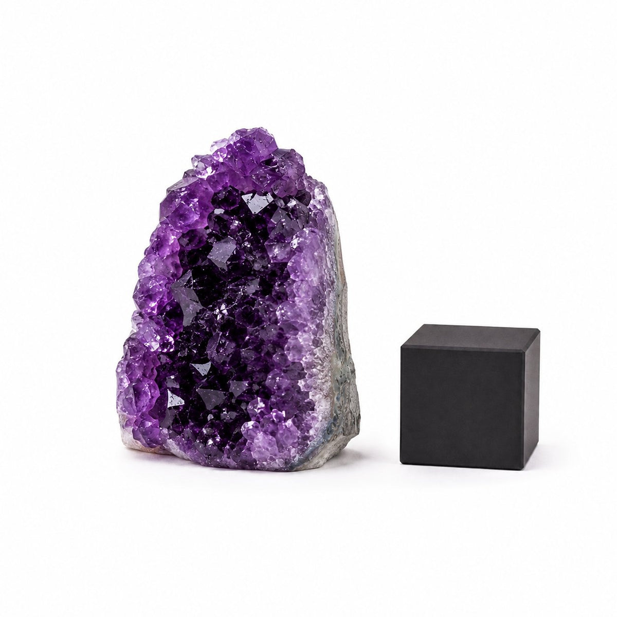 Raw purple amethyst geode cluster