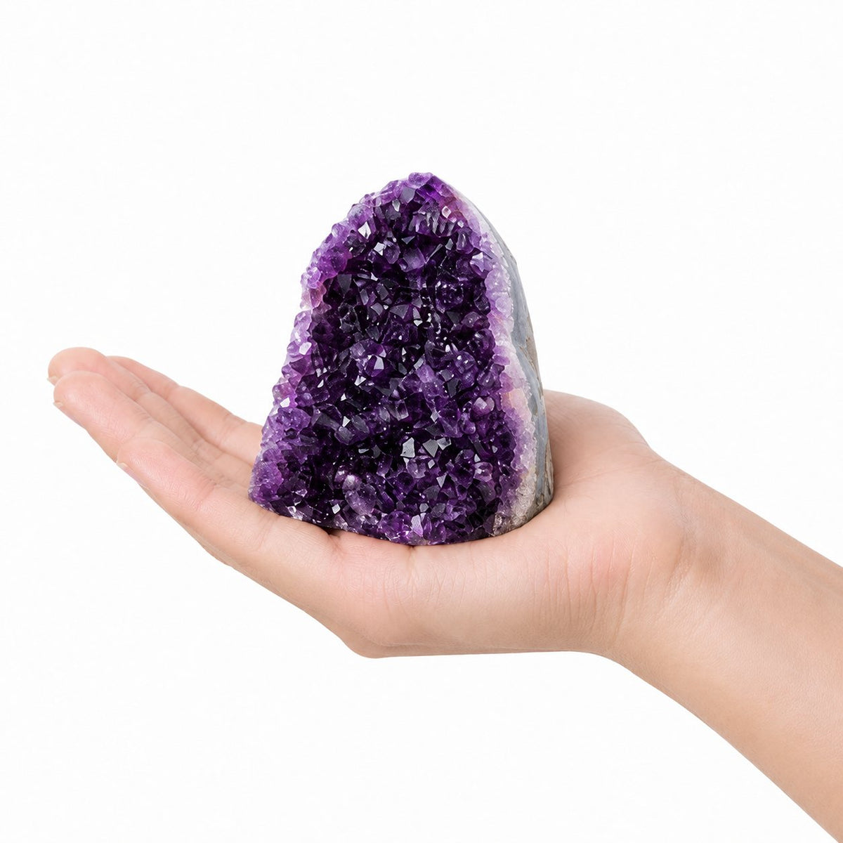 Raw purple amethyst geode cluster