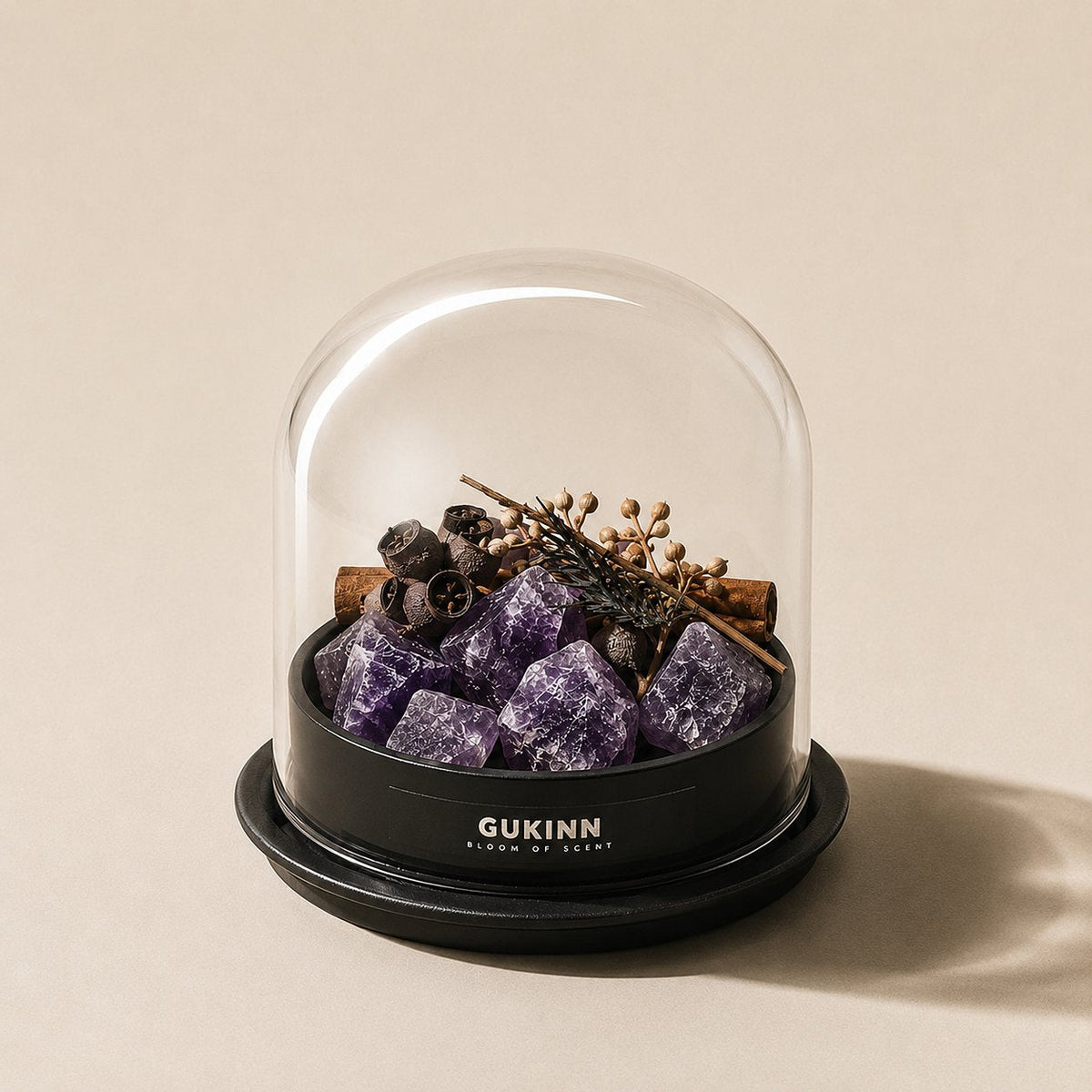 Glass aromatherapy dome with amethyst crystals