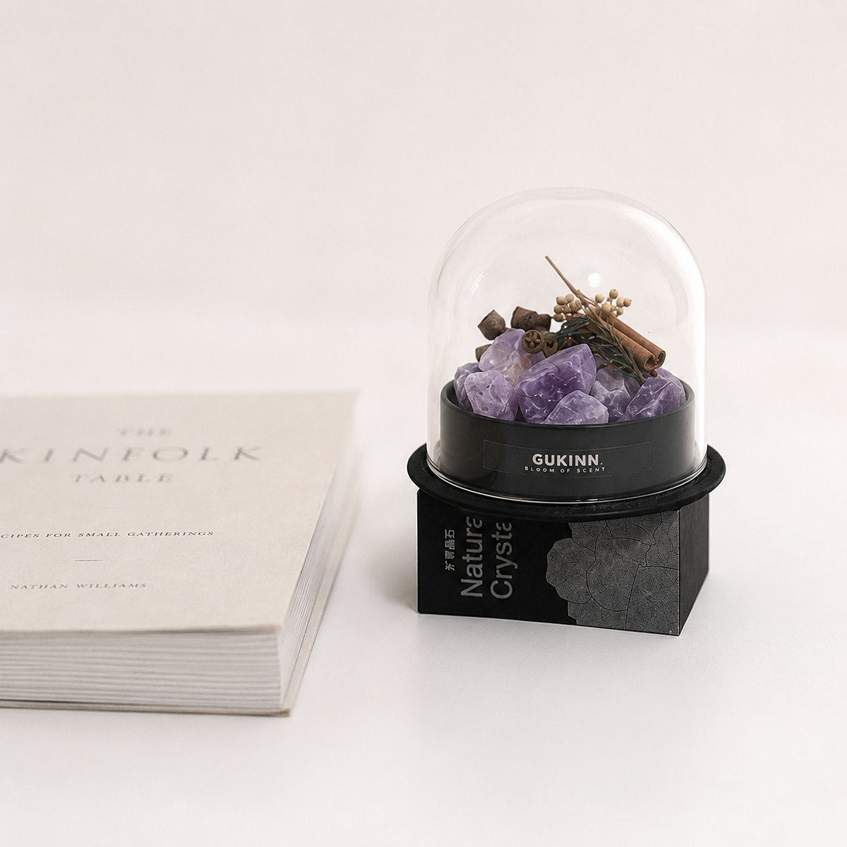 Glass aromatherapy dome with amethyst crystals